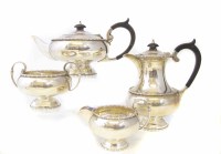 Lot 340 - A silver four piece tea set by Walker & Hall
