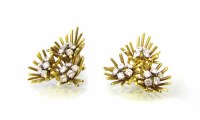 Lot 371 - A pair of 1960's diamond triple cluster organic design 18K gold clip earrings