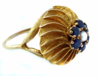 Lot 374 - Yellow metal 1960's design cluster ring.