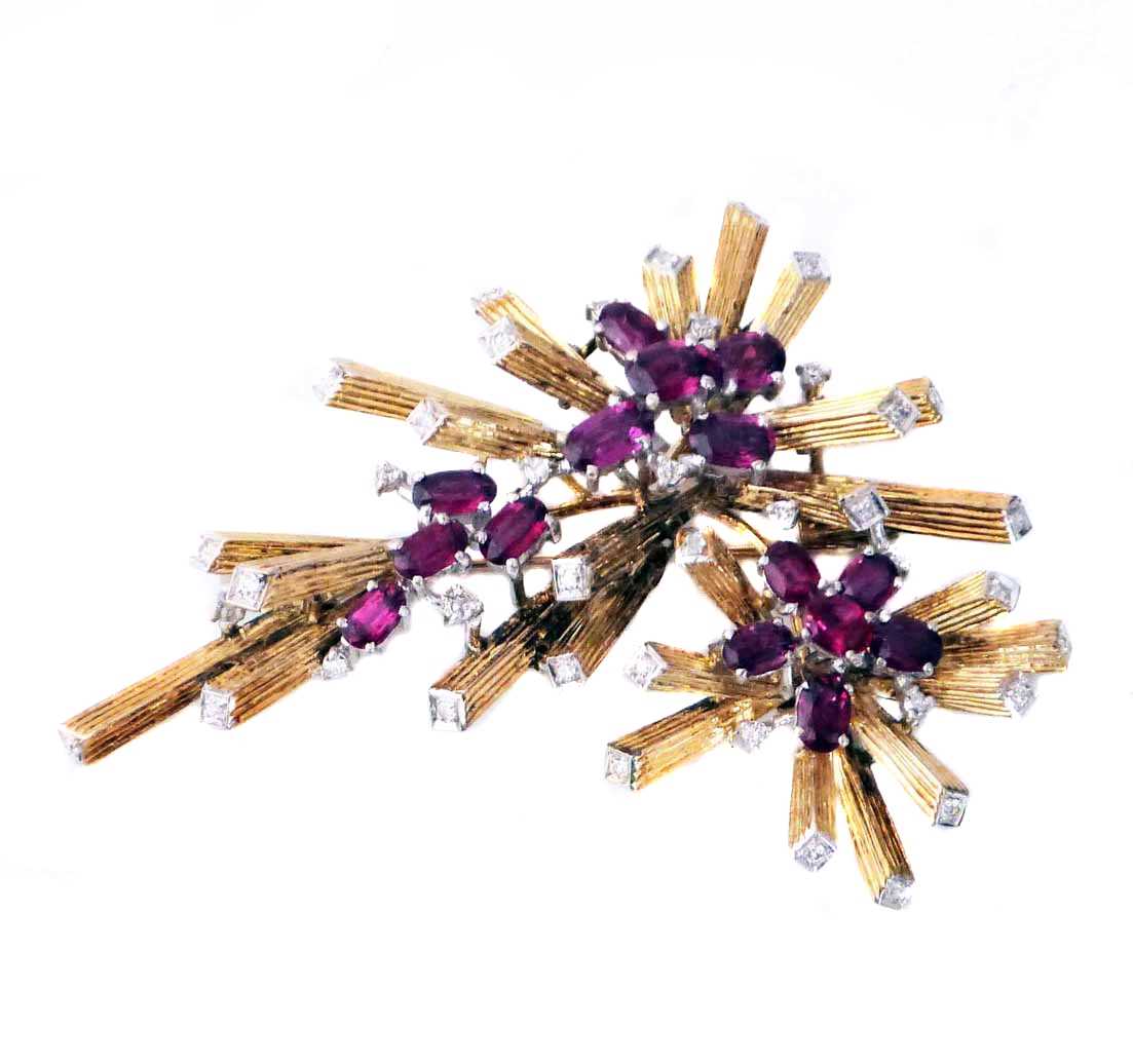 Lot 376 - A 1970s 18ct gold ruby and diamond brooch