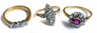 Lot 382 - Three diamond set rings comprising and ruby and