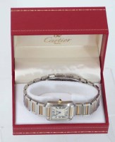 Lot 396 - Lady's cartier tank francaise steel and yellow