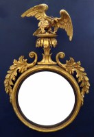 Lot 607 - A Regency convex wall mirror