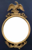 Lot 608 - A Regency convex wall mirror
