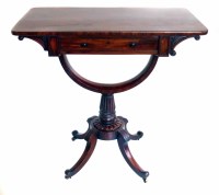 Lot 629 - Regency figured mahogany sewing table