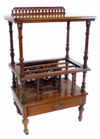 Lot 667 - Victorian figured walnut canterbury