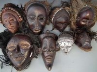 Lot 23 - Eight masks carved in Chokwe and similar tribal