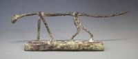 Lot 43 - Mali brass or bronze cat similar to Giacometti