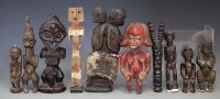 Lot 53 - Ten African figures carved in various tribal styles, the tallest figure measures 21.5cm high