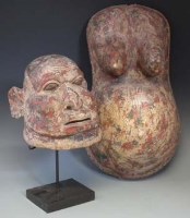 Lot 63 - Makonde helmet mask and a similar pregnancy belly