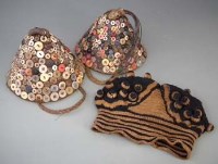 Lot 84 - Two Bwami button hats, also a Bamana knitted hat