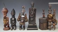 Lot 99 - Two Yaka figures, Songye Nkisi and rattle