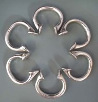 Lot 105 - Six Hausa Manillas, silver plated bronze. 6cm wide