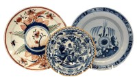 Lot 74 - Two Delft plates and a small dish, all