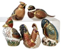 Lot 104 - Five Royal Crown Derby bird paperweights, to