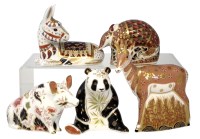 Lot 109 - Five Royal Crown Derby paperweights, to include
