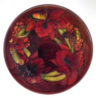 Lot 134 - Moorcroft flambe charger.