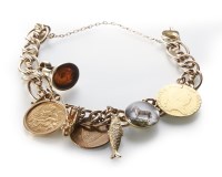 Lot 182 - A Victorian 9ct gold charm bracelet with seventeen charms