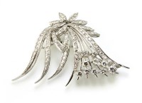 Lot 210 - 18ct white gold and platinum diamond set stylized spray brooch
