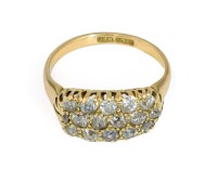Lot 237 - A diamond 3 row 18ct gold ring