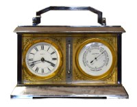 Lot 521 - An early 20th century silver plated carriage clock incorporating barometer