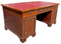 Lot 538 - An Edwardian mahogany partners desk