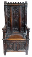 Lot 563 - 19th century Gothic design oak box chair settle