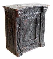 Lot 569 - Primitive oak carved side cupboard