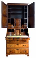 Lot 581 - Early 18th century walnut veneered bookcase on bureau
