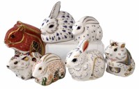 Lot 172 - Seven Royal Crown Derby paperweights, to include