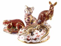 Lot 179 - Four boxed Royal Crown Derby paper weights