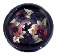 Lot 194 - Moorcroft pansy pattern bowl.