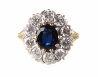 Lot 282 - Sapphire and diamond oval cluster ring, the centre oval blue sapphire approx. 8mm x 7mm, approx. 1.50ct, cluster surround 10 round brilliant cut diamo