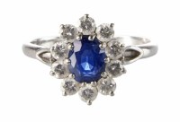 Lot 285 - Sapphire and diamond oval cluster 18ct white gold