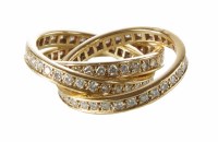 Lot 292 - Cartier 18ct gold diamond inter-locking 3 section ring