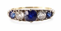 Lot 311 - Sapphire and diamond five stone boat head 18ct yellow gold ring