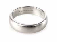 Lot 312 - Tiffany & Co. platinum wedding ring