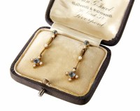 Lot 318 - A pair of late Victorian/Edwardian aquamarine and seed pearl set yellow gold drop earrings, the aquamarines approx 3.5 and 3.0mm diameter, screwback n