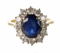 Lot 319 - Sapphire and diamond oval cluster ring, the centre oval mixed cut blue sapphire weighing approx. 2ct, cluster surround of 12 round brilliant cut diamo