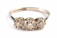 Lot 335 - Diamond three stone platinum ring
