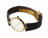 Lot 338 - Lady's Must de Cartier gold plated silver watch on leather strap