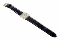Lot 347 - Ladie's Cartier tank steel and yellow gold watch