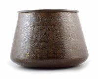 Lot 604 - Middle Eastern bronze cooking pot with Islamic calligraphy.