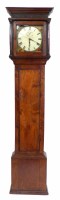 Lot 635 - An oak longcase clock