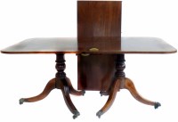 Lot 650 - Regency twin-pedestal dining table.
