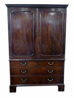 Lot 651 - George III mahogany linen press.