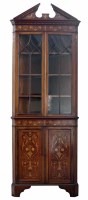 Lot 653 - Edwardian mahogany corner cupboard.