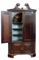 Lot 659 - George III corner cupboard.
