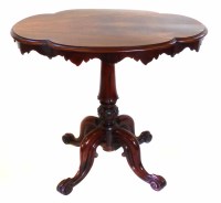 Lot 692 - Victorian figured tip-up table.