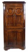 Lot 720 - Late 18th century oak corner cupboard.